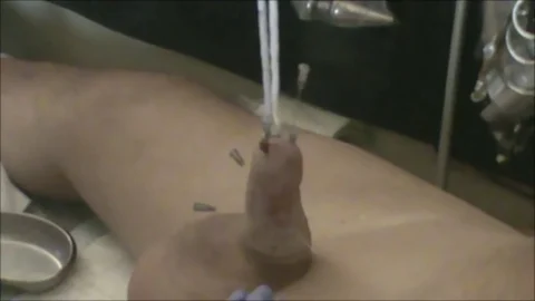 8 Needles deep into and through cock shaft | PenisCrush.com